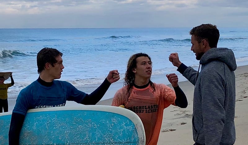 grauer surf class students with their teacher