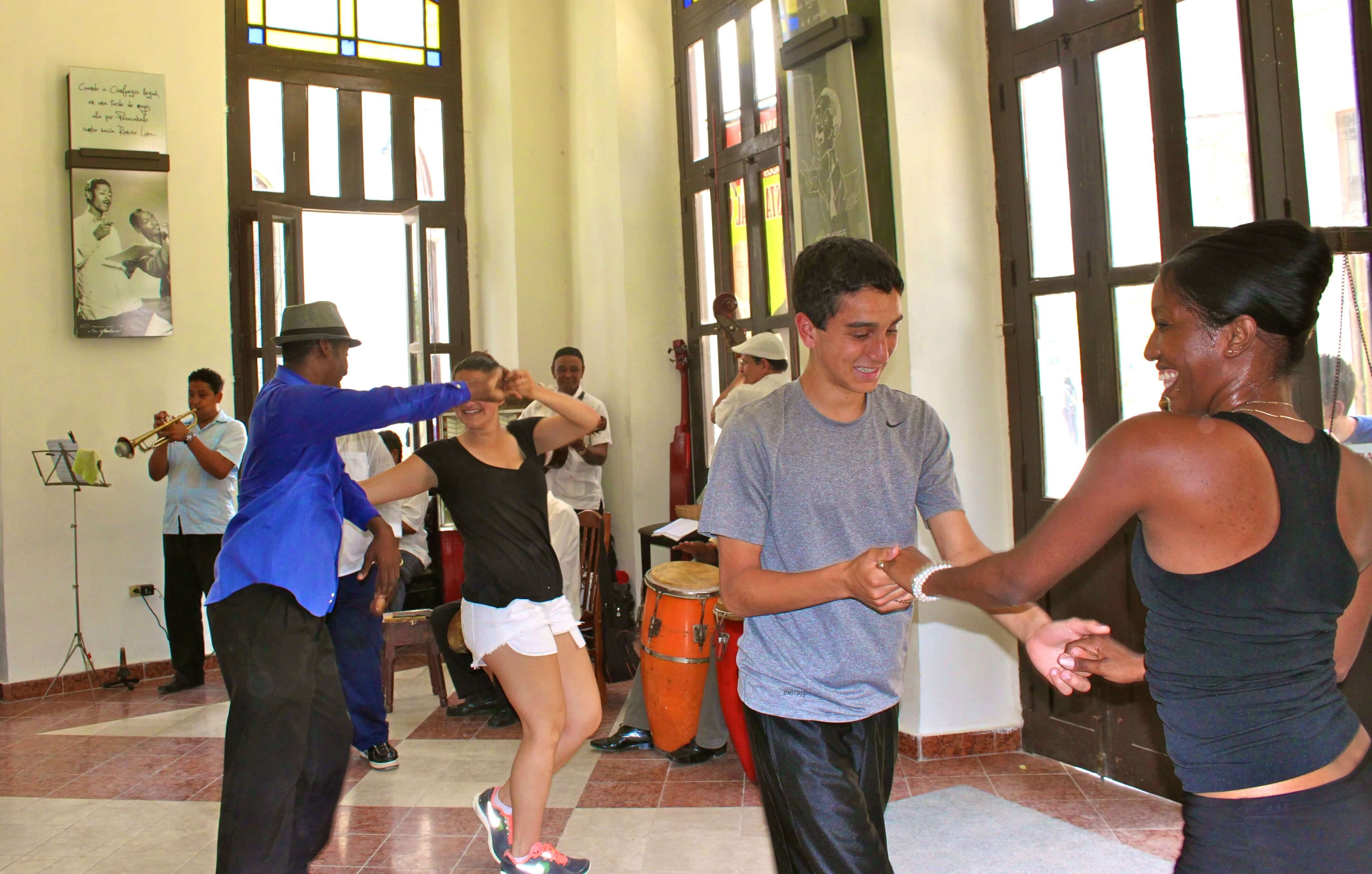 students of all ages dancing together